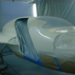 Spraying White onto Fuselage